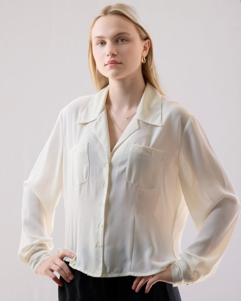 Adelaide studio headshot of woman in sheer white blouse – natural light style
