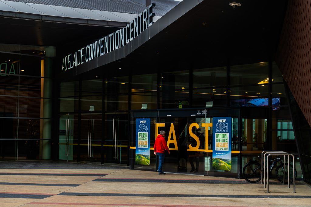 Adelaide Convention Centre entrance with signage for the 2024 National Conference.