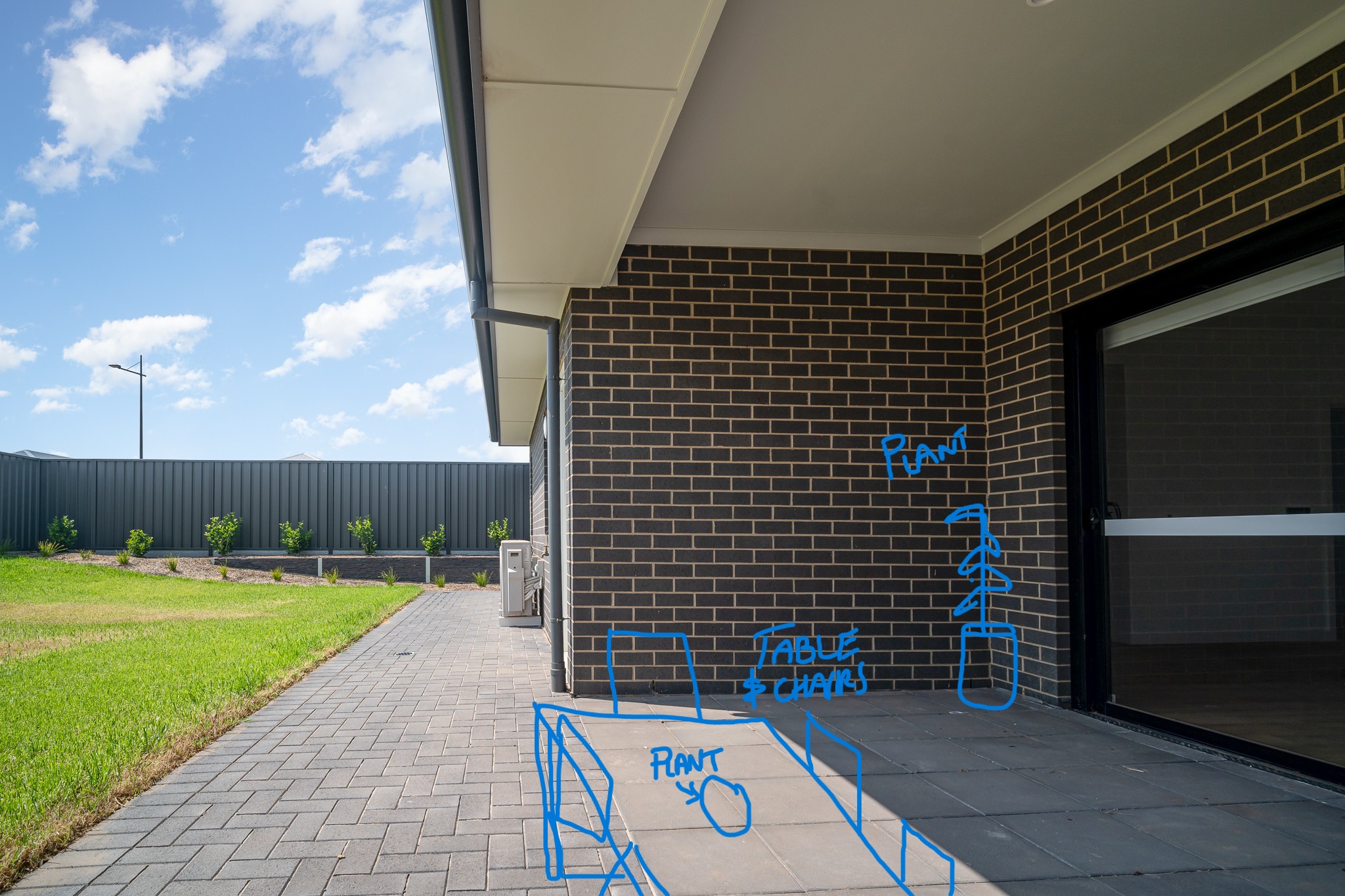 Outdoor patio of an SDA home in Murray Bridge with hand-drawn staging notes for furniture and plants.