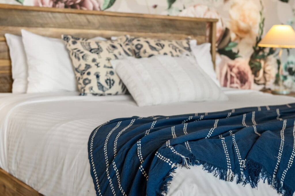 Styled bedroom detail photographed for a Mount Barker Springs Airbnb property